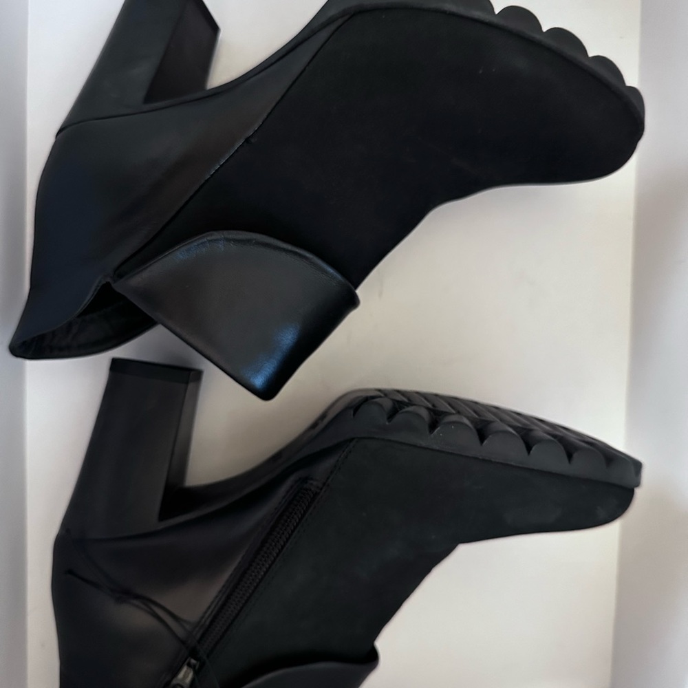 The Flexx black leather and suade booties